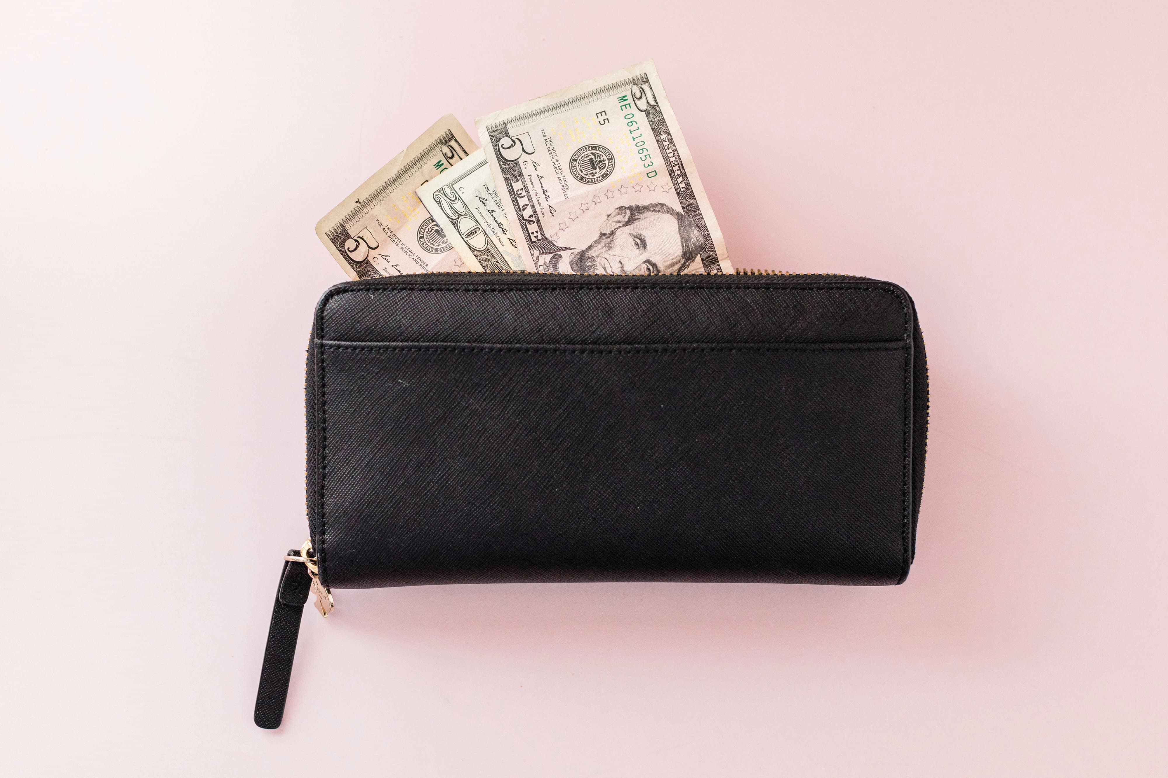 money in wallet. best side jobs for teachers to make extra money
