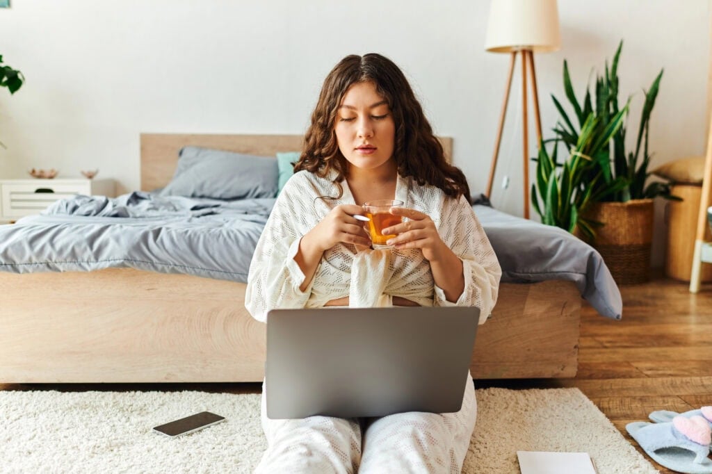 person working from their bedroom on the flood