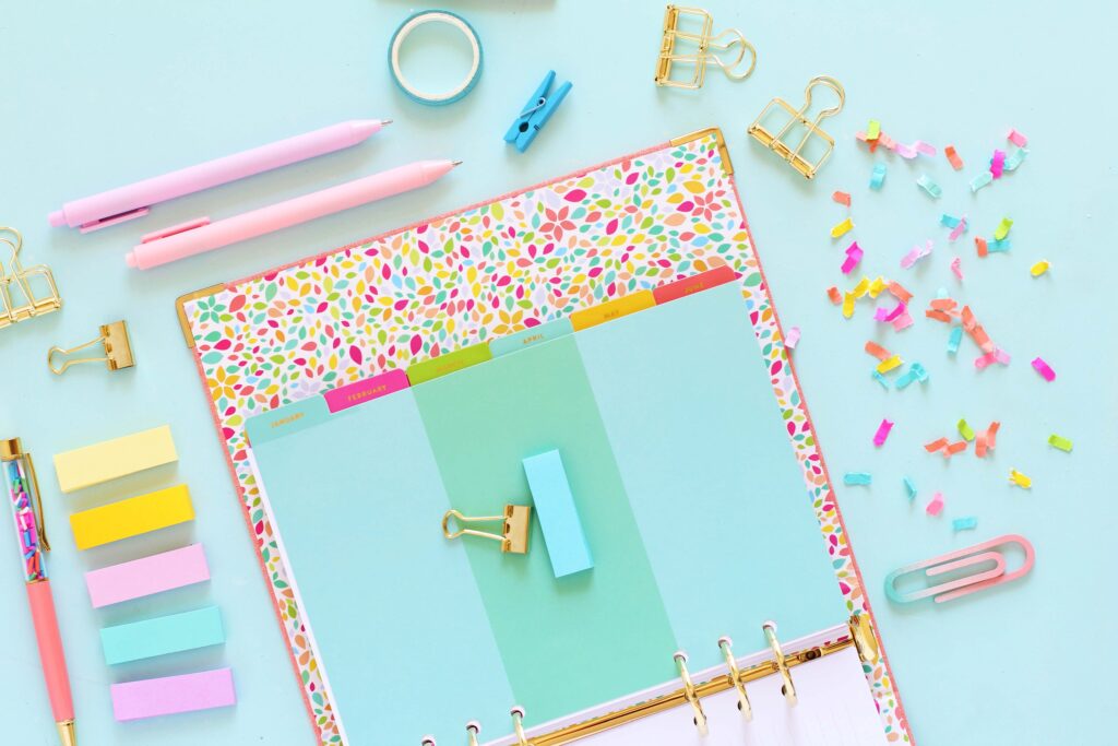planner on desk with blue background